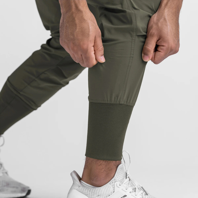 QUICK DRY SKINNY DRAWSTRING MULTI POCKET RUNNING PANTS