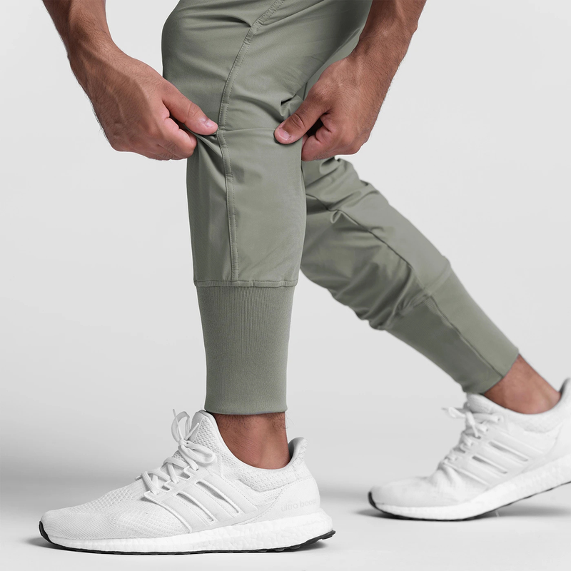 QUICK DRY SKINNY DRAWSTRING MULTI POCKET RUNNING PANTS