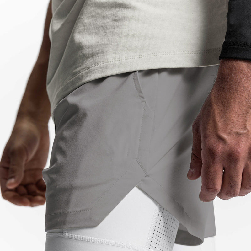 ESSENTIAL QUICK DRY POCKET 2 IN 1 7'' INSEAM ACTIVE SHORTS