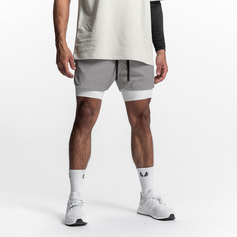 ESSENTIAL QUICK DRY POCKET 2 IN 1 7'' INSEAM ACTIVE SHORTS