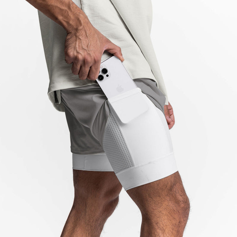 ESSENTIAL QUICK DRY POCKET 2 IN 1 7'' INSEAM ACTIVE SHORTS